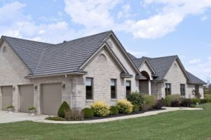 Residential gray home with roof